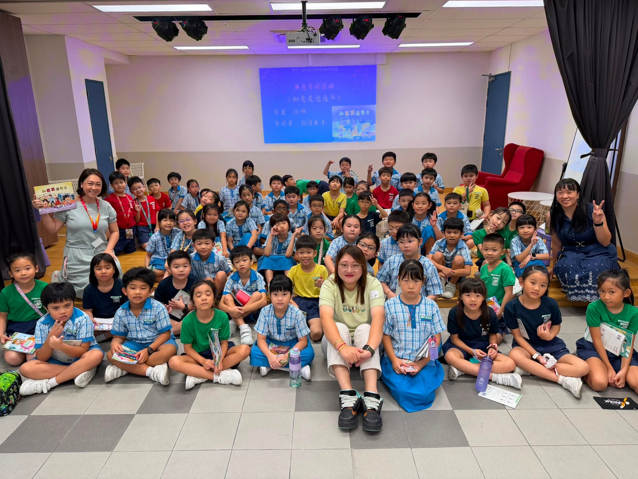 A group photo of the students and the parent volunteer at the Chinese Language story-telling session